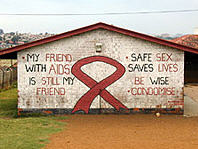 AIDS awareness messages painted on a building in South Africa.